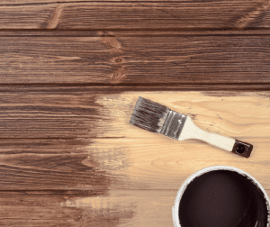 paint brush staining hardwood floor